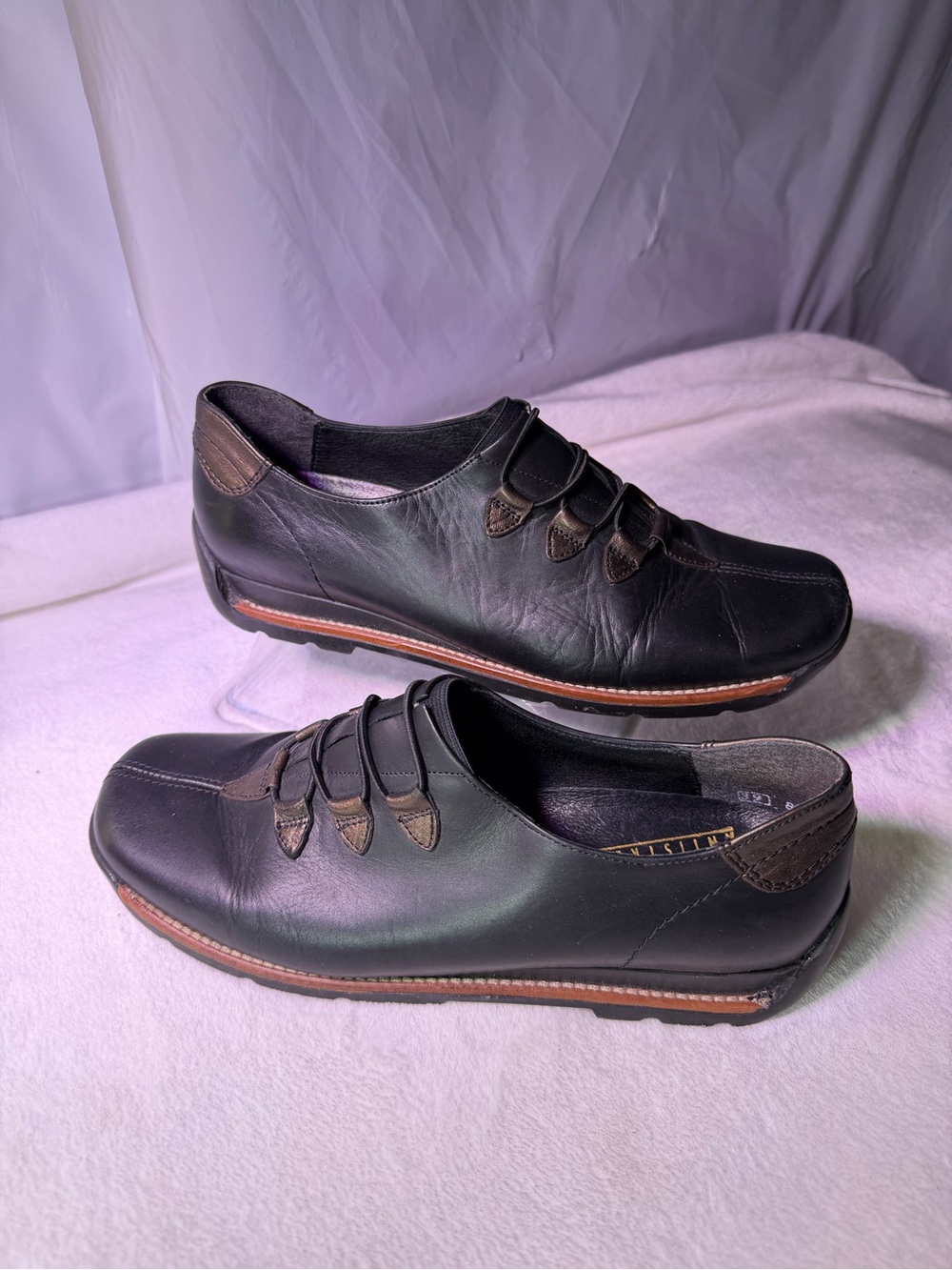 Rieker Black Leather Slip-On Loafers with Brown Accents